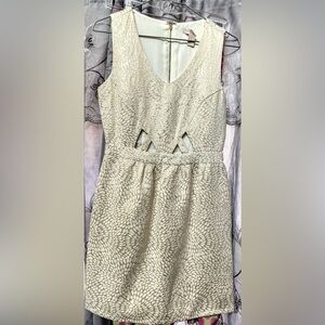 VINTAGE mini dress with elegant metallic detail and flattering cutouts size XS